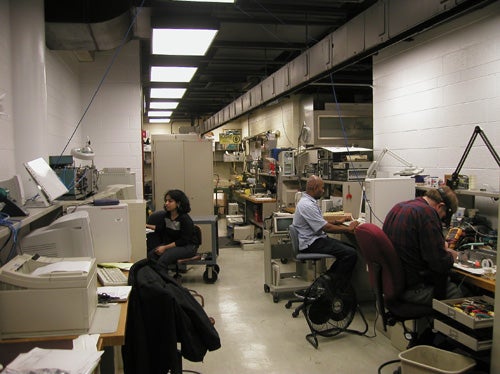 Staff working in the electronics shop