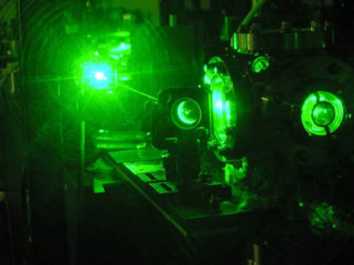 An electron microscope reflecting green light